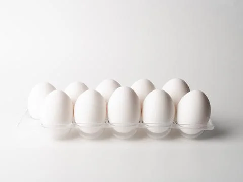 Chicken eggs  on a white background Stock Photos