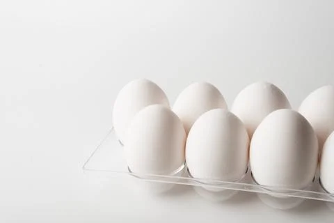 Chicken eggs  on a white background Stock Photos