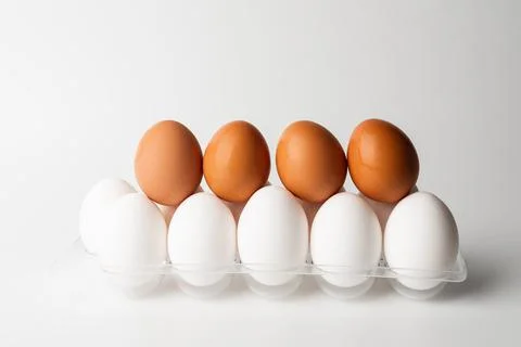 Chicken eggs  on a white background Stock Photos