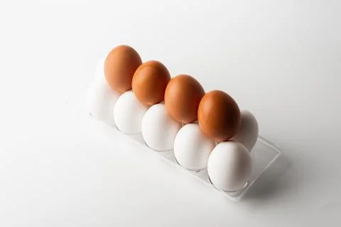 Chicken eggs  on a white background Stock Photos