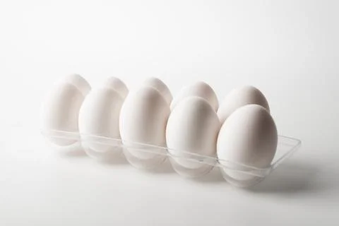 Chicken eggs  on a white background Stock Photos