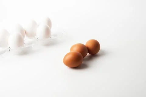 Chicken eggs  on a white background Stock Photos
