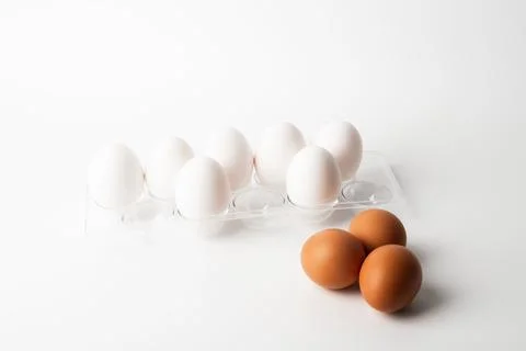 Chicken eggs  on a white background Stock Photos