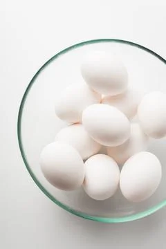 Chicken eggs  on a white background Stock Photos