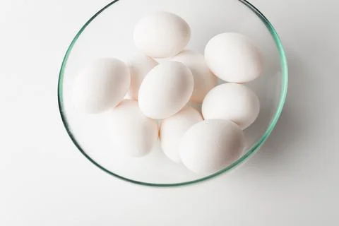 Chicken eggs  on a white background Stock Photos