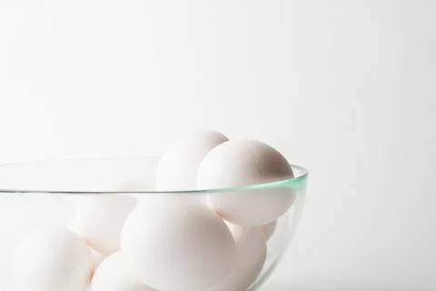 Chicken eggs  on a white background Stock Photos