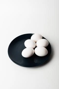 Chicken eggs  on a white background Stock Photos
