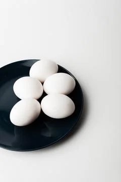 Chicken eggs  on a white background Stock Photos