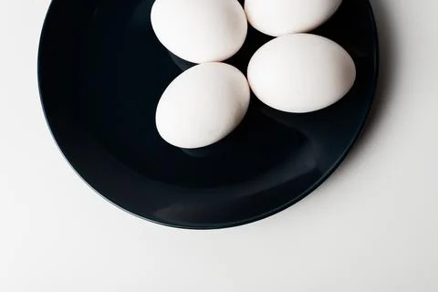 Chicken eggs  on a white background Stock Photos
