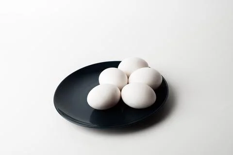 Chicken eggs  on a white background Stock Photos
