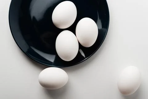 Chicken eggs  on a white background Stock Photos