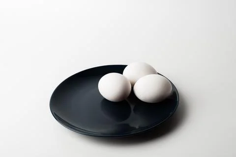 Chicken eggs  on a white background Stock Photos