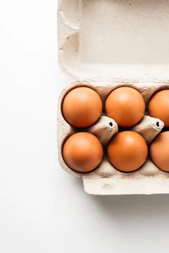 Chicken eggs  on a white background Stock Photos