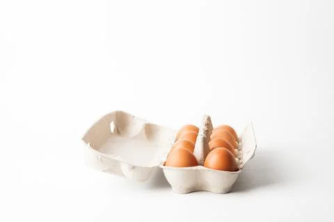 Chicken eggs  on a white background Stock Photos