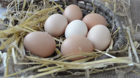 Chicken eggs in the wicker basket Stock-Footage 43803216