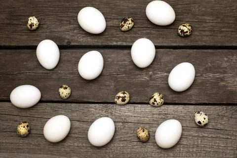 Chicken eggs on wooden rustic table. Top view. Stock Photos