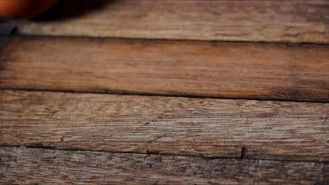 Chicken eggs on wooden table Stock Footage 104689270