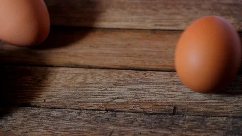 Chicken eggs on wooden table Stock-Footage 104689279
