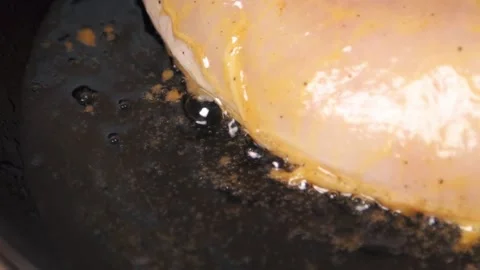 Chicken fillet is fried in a pan. Stock Footage 161114930