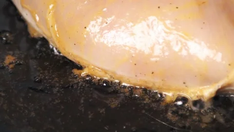 Chicken fillet is fried in a pan. Stock Footage 161114938