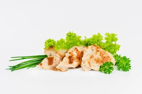 Chicken fillets fried until half cooked, semi-finished product with fresh herbs Stock Photos