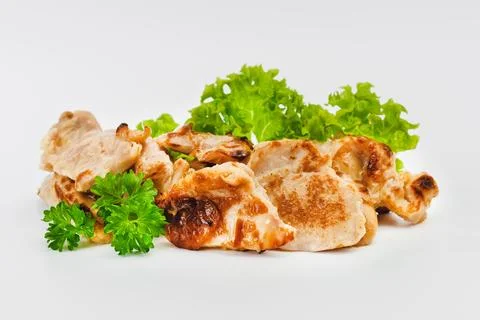 Chicken fillets fried until half cooked, semi-finished product with fresh herbs Stock Photos