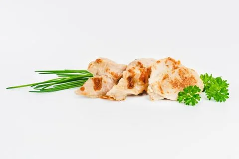 Chicken fillets fried until half cooked, semi-finished product with fresh herbs Stock Photos
