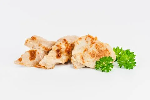 Chicken fillets fried until half cooked, semi-finished product with fresh herbs Stock Photos