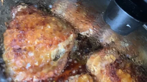 Chicken is fried in a pot Video stock 220944834