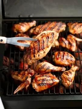 Chicken on the Grill; BBQ Fork Foto stock