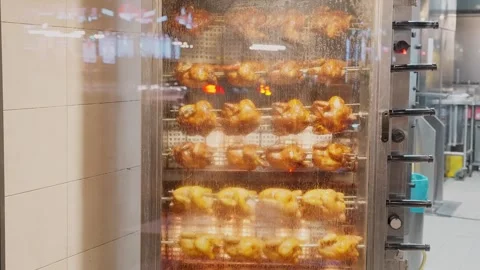 Chicken Grill Machine through a Window Stock Footage 300353480