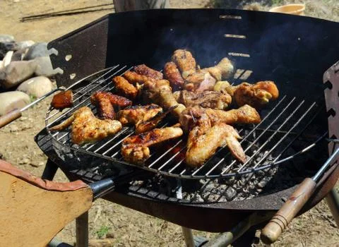 Chicken on grill Stock Photos