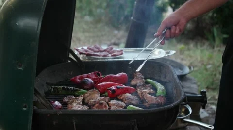 Chicken grilling on barbeque Stock Footage 55825275