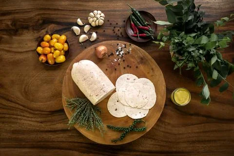 Chicken ham on rustic wood table with natural ingredients Stock Photos