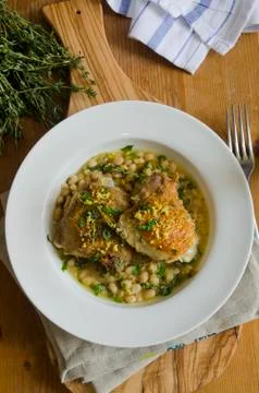Chicken with haricot beans Stock Photos