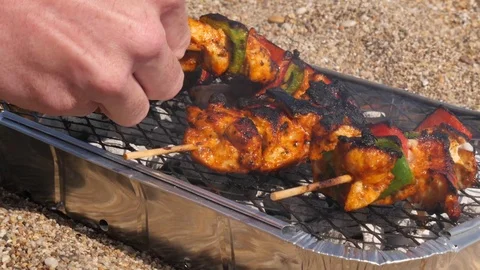 Chicken kebabs cooking on a BBQ Stock Footage 74603866