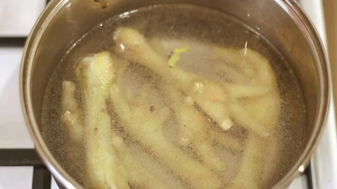 Chicken legs cooked in a pan Stock Footage 97823524