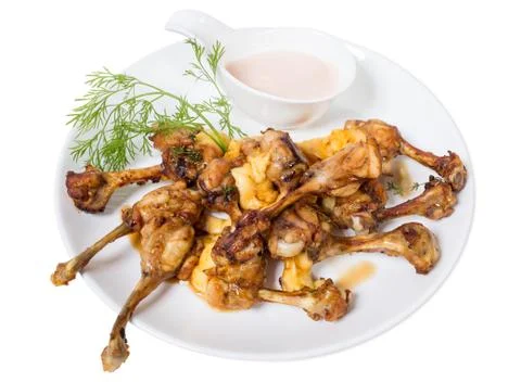 Chicken legs with melted cheese. Stock Photos