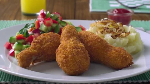  Chicken legs on plate Stock-Footage 81804079