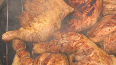 Chicken legs roasted on the grill Video stock 70984130
