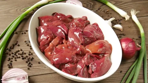 Chicken liver on a plate. Stock Footage 295880017