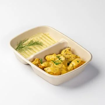 Chicken with mashed potatoes in a plate Stock Photos