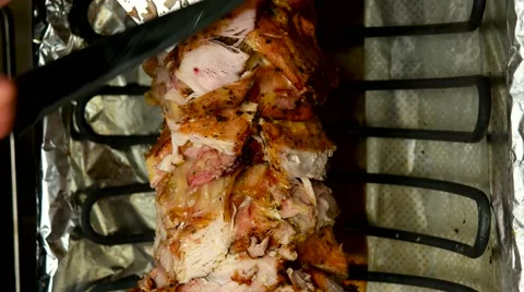 Chicken meat being cut before making a shawarma or doner kebab Stock Footage 59185531