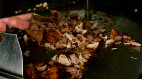 Chicken meat being cut before making a shawarma Stock Footage 59185643