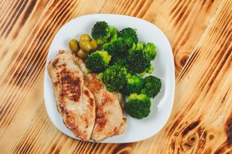 Chicken meat with broccoli Stock Photos