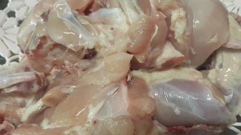 Chicken meat: Close up view of raw, fresh, choped and sliced chicken meat in  Stock Photos