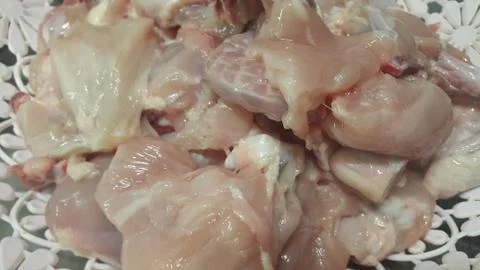 Chicken meat: Close up view of raw, fresh, choped and sliced chicken meat in  Foto stock