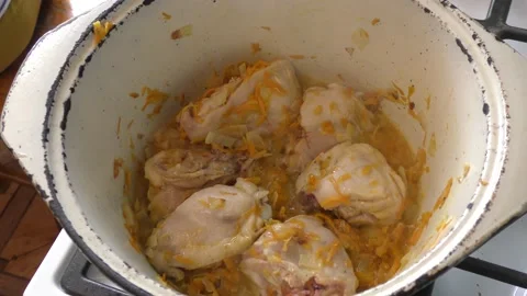 Chicken meat is cooked in a pan Stock Footage 163044422