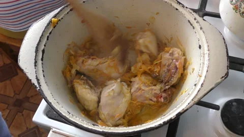 Chicken meat is cooked in a pan Stock Footage 163046249