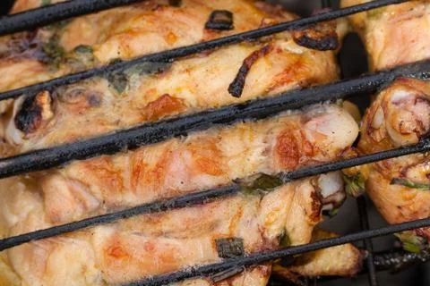 Chicken meat on fire .  It is appetizingly prepared Stock Photos